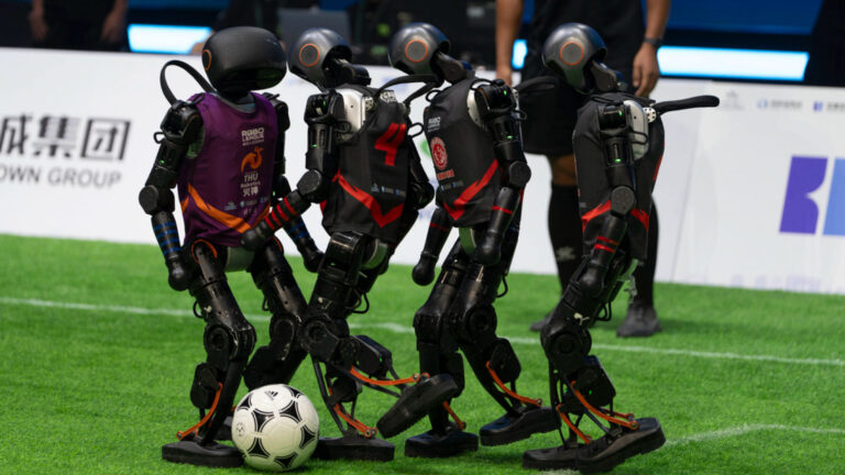 China Kicks Off First AI-Powered 3-on-3 Humanoid Robot Soccer Match in Beijing
