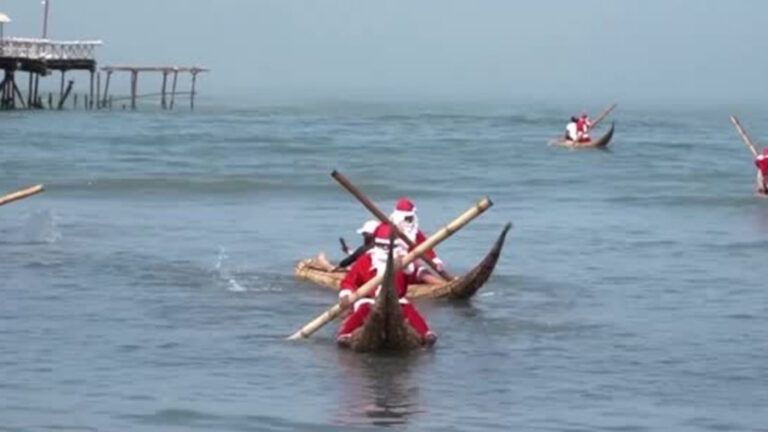 Santa-Suited Fishermen Take Peru’s Iconic Reed Boats Out for Christmas